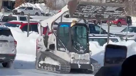 skid steer vs cop|'On a rampage': Video shows Nebraska man slam Bobcat into .